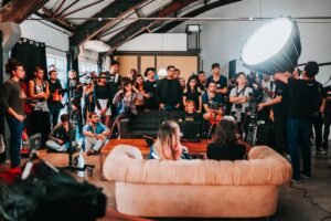 HOME Behind-the-scenes of a photo shoot with a diverse team working together in a São Paulo studio.