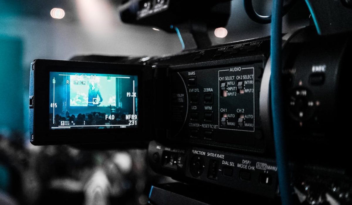pexels photo 66134 HD video camera capturing a live event; focus on screen and controls.